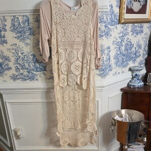 Adorable Cream Lace/Crochet High -low top. Shorter in front longer In back. S